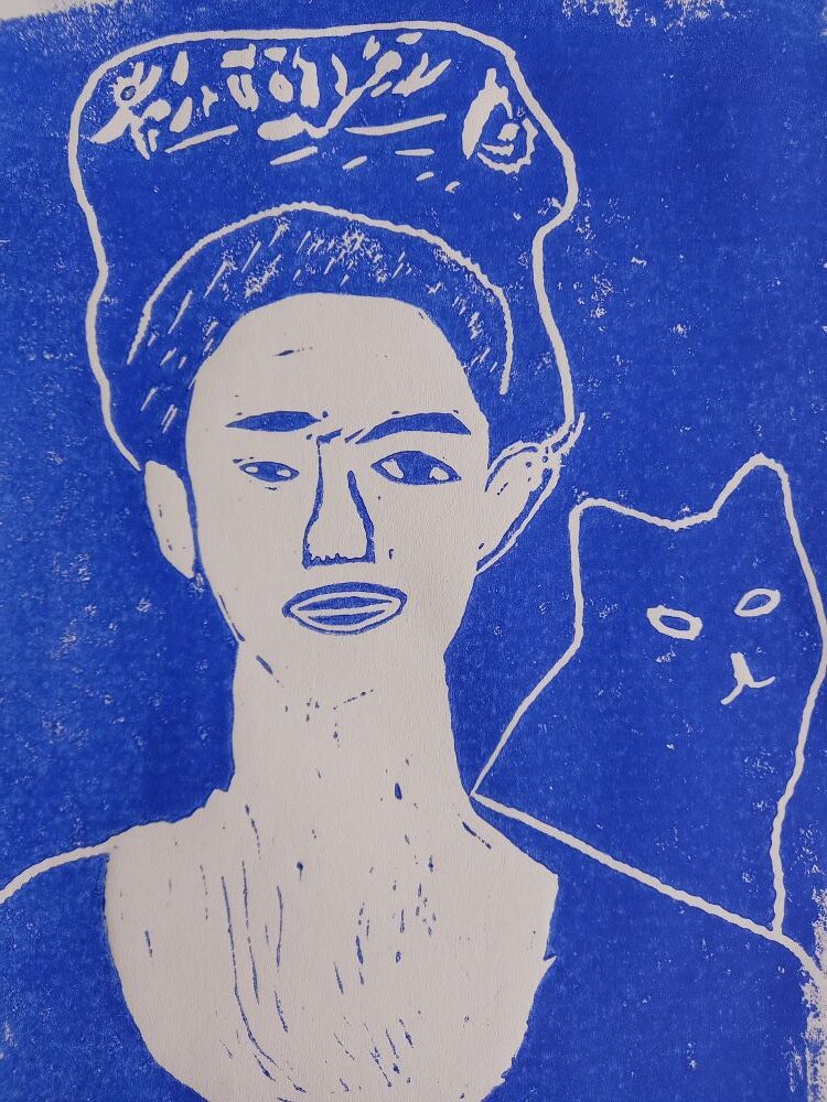 Ein Linolschnitt eines Gemäldes von einer Frau mit einer Katze.