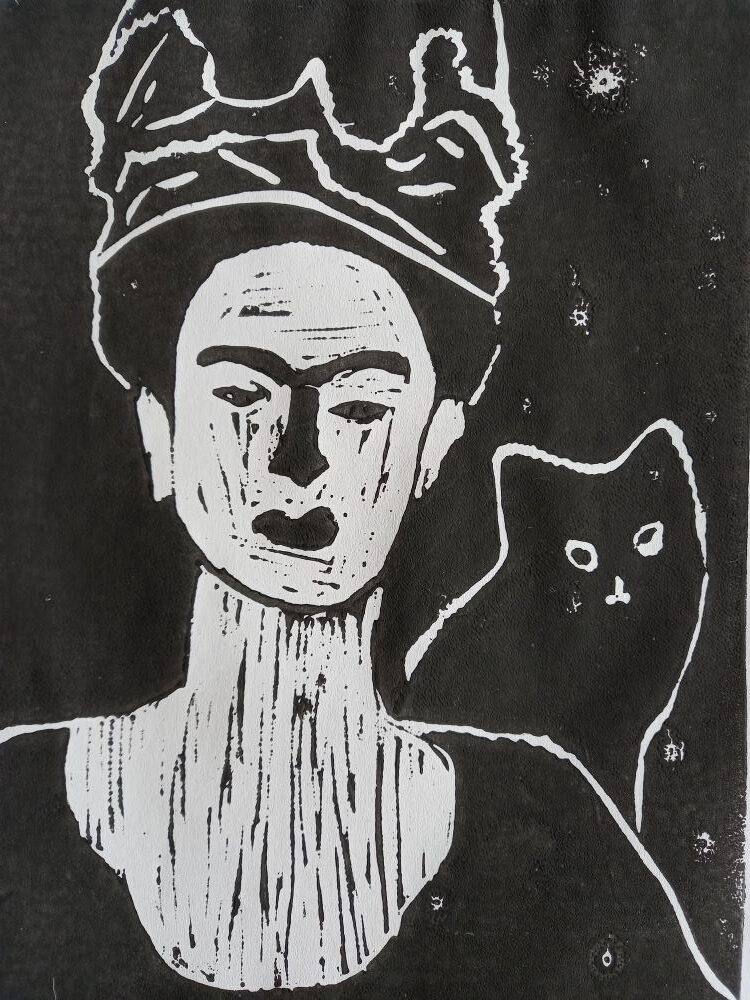 Ein Linolschnitt eines Gemäldes von einer Frau mit einer Katze.